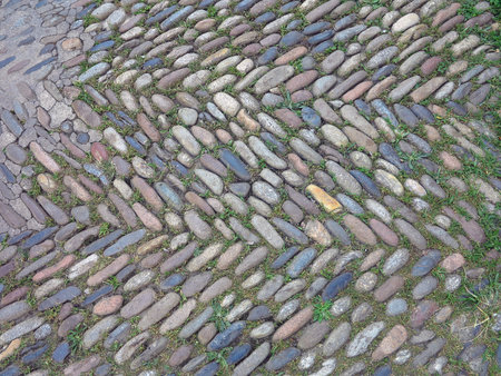 Old stone pavement road on the medieval street of Spainの写真素材