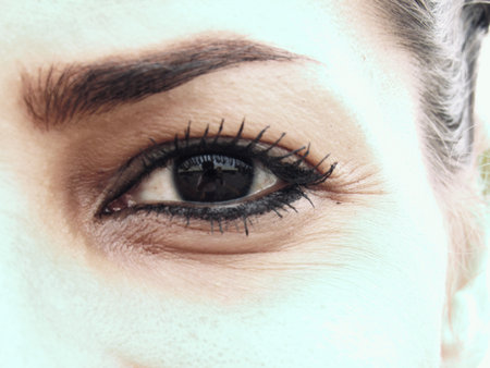 Young woman eye with hope and power and kindnessのeditorial素材