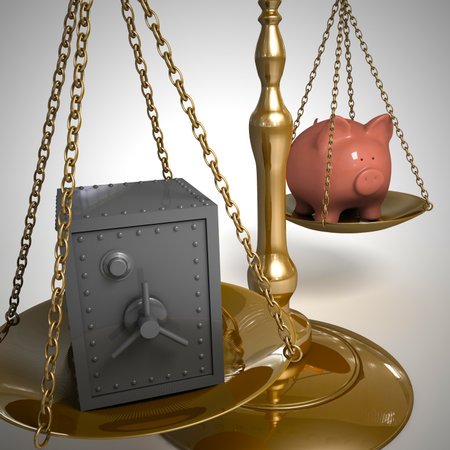 Piggy bank and bank safe on the scale.の写真素材