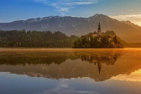 Lake Bled in the morning at sunrise, Julian Alps, Slovenia.の写真素材