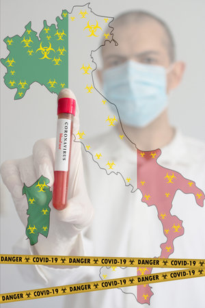Doctor wearing a medical face mask and gloves, holding a blood test for the Coronavirus COVID-19 pandemic rapidly spreading and national flag of Italy. Coronavirus warning conceptual photo.の写真素材