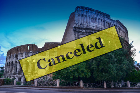 Ancient Roman Colosseum, famous tourist destination in Rome, Italy. Travel vacations canceled because of pandemic of coronavirus Covid-19, conceptual photo.の写真素材