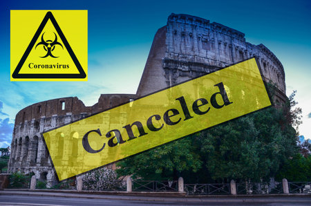 Ancient Roman Colosseum, famous tourist destination in Rome, Italy. Travel vacations canceled because of pandemic of coronavirus Covid-19, conceptual photo.の写真素材