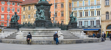 Graz/Austria - March 09, 2020: Man on city street wearing a face mask for protection against viruses during coronavirus COVID-19 and flu outbreakのeditorial素材