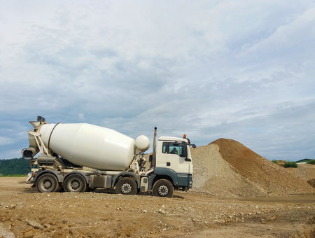 Concrete mixer truck working on construction site.の写真素材