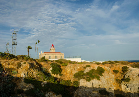 The lighthouse near Ponta da Piedade, in Lagos, Western Algarve, Portugal.の写真素材