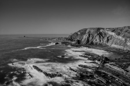 Wild and undiscovered beaches and cliffs in the Algarve's West Coast, near Lagos, Portugal.の写真素材
