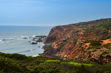 Wild and undiscovered beaches and cliffs in the Algarve's West Coast, near Lagos, Portugal.の写真素材