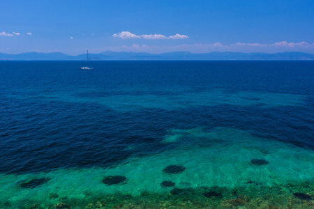 The clear and blue waters of Mediterranean sea in the Saronic gulf, Greece.の写真素材