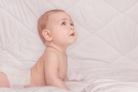 Sweet little baby boy portrait on white backgroundの写真素材