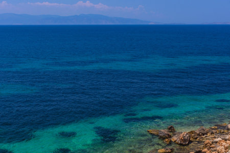 The clear and blue waters of Mediterranean sea in the Saronic gulf, Greece.の写真素材