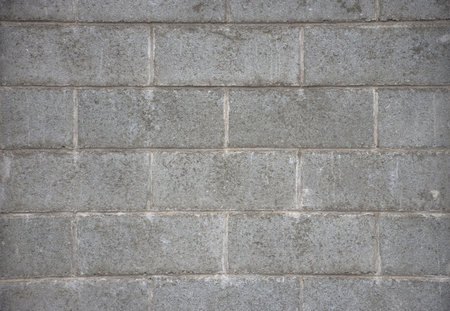 Old grey brick wall texture, abstract backgroundの写真素材