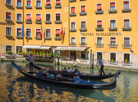 Venice, Italy - April 20, 2019: gondolas in front of Hotel Cavalletto in a beautiful sunny day.のeditorial素材