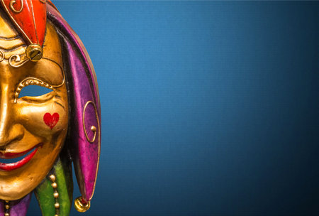 Traditional Venetian mask on the streets of Venice, Italy, isolated on colorful background.の写真素材