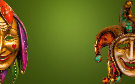 Traditional Venetian mask on the streets of Venice, Italy, isolated on colorful background.の写真素材