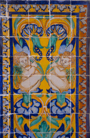 Ornamental old typical tiles from Portugal called "azulejos" made with colored ceramic tiles, who decorates the houses in Lisbon, Portugalの写真素材