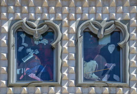 Lisbon, Portugal - 08 august 2017: arched windows, portuguese Manueline style, on Museum of Lisbon (Casa dos Bicos) building with his curious facade of spikesの写真素材