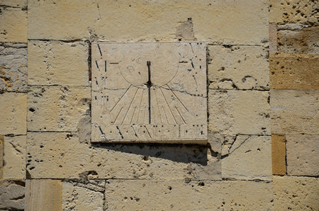 Sun dial, solar wall clock on a building in Lisbon, Portugalの写真素材