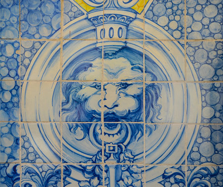 Ornamental old typical tiles from Portugal called "azulejos" made with colored ceramic tiles, who decorates the houses in Lisbon, Portugalの写真素材