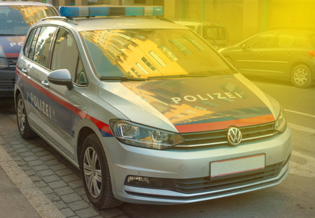 Modern electric car plugged in charging on the street station. New energy vehicles, environment friendly alternative energy for carsのeditorial素材
