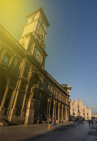 Milan/Italy - July 09, 2016: People walking on the street and Milan Cathedral in the background, famous tourist destinationのeditorial素材