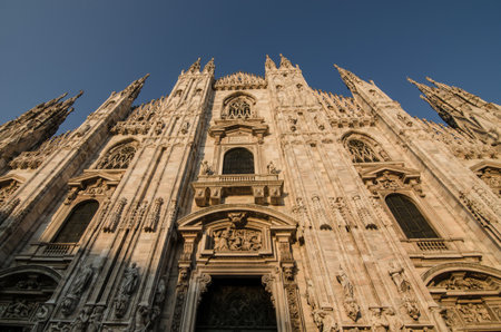 Detail of Milan Cathedral facade, famous tourist destination in Milan, Lombardy, Italy.のeditorial素材