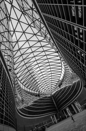 Milan/Italy- July 10, 2016: architectural detail of the modern glass Lombardy Building (Palazzo Lombardia), a 161 m tall skyscraper and the main seat of the government of Lombardyのeditorial素材