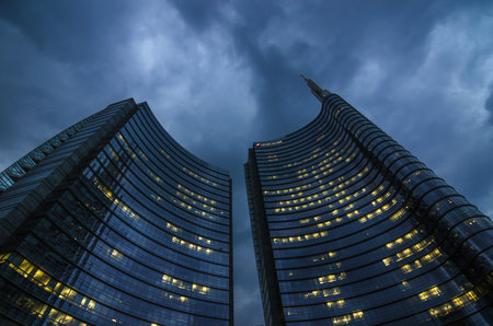 Milan/Italy- July 12, 2016: modern building of Unicredit tower in new Porta Nuova business district, the tallest skyscraper in Italy, by nightのeditorial素材