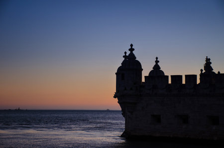 Belem tower, famous tourist attraction in Lisbon, Portugal, at sunsetのeditorial素材