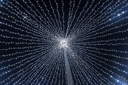 Abstract bokeh background. Sparkling winter decorations lights, at night.の写真素材