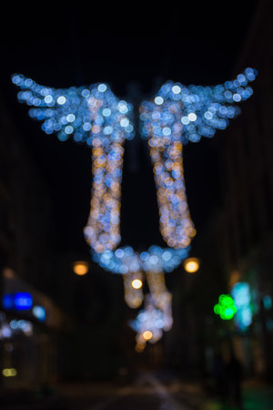 Abstract bokeh background. Sparkling winter decorations lights, at night.の写真素材