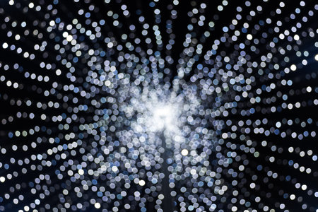 Abstract bokeh background. Sparkling winter decorations lights, at night.の写真素材