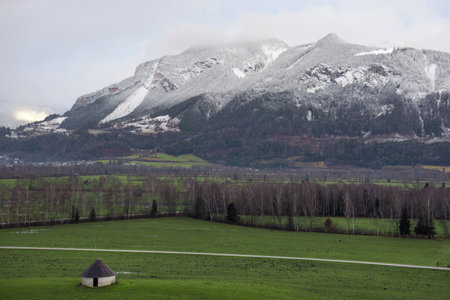 Small beautiful austrian village surrounded by mountains in Ennstal, Steiermark, Austriaの写真素材