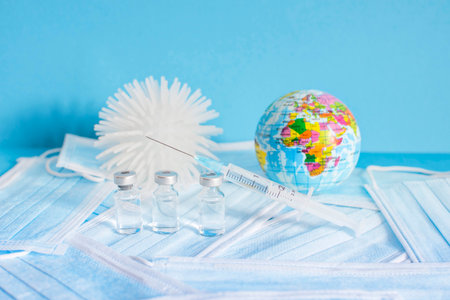 Conceptual photo for worldwide pandemic vaccination, beginning of mass vaccination for , influenza or flu, world immunization. Selective focusの写真素材