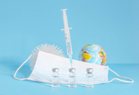 Conceptual photo for worldwide pandemic vaccination, beginning of mass vaccination for , influenza or flu, world immunization. Selective focusの写真素材