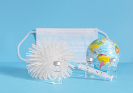 Conceptual photo for worldwide pandemic vaccination, beginning of mass vaccination for coronavirus COVID-19, influenza or flu, world immunization. Selective focusの写真素材