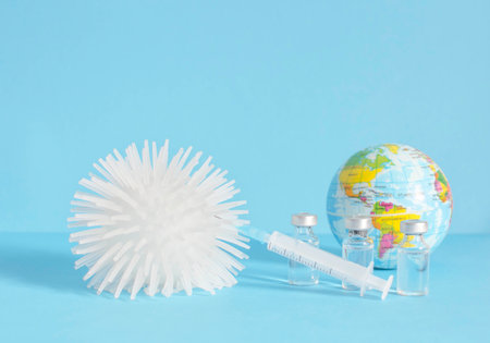 Conceptual photo for worldwide pandemic vaccination, beginning of mass vaccination for coronavirus COVID-19, influenza or flu, world immunization. Selective focusの写真素材
