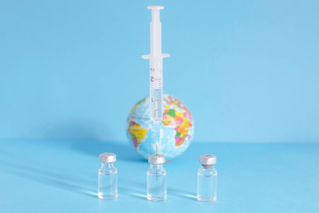 Conceptual photo for worldwide pandemic vaccination, beginning of mass vaccination for coronavirus COVID-19, influenza or flu, world immunization. Selective focusの写真素材