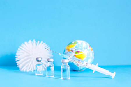 Conceptual photo for worldwide pandemic vaccination, beginning of mass vaccination for coronavirus COVID-19, influenza or flu, world immunization. Selective focusの写真素材