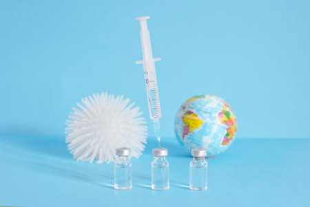 Conceptual photo for worldwide pandemic vaccination, beginning of mass vaccination for coronavirus COVID-19, influenza or flu, world immunization. Selective focusの写真素材