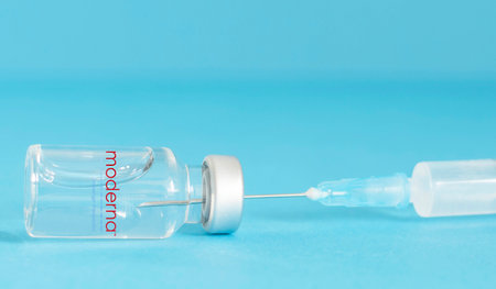 Graz, Austria-26.01.2021: Worldwide pandemic vaccination with the Moderna vaccine, beginning of mass vaccination for coronavirus, world immunization conceptual photo.のeditorial素材