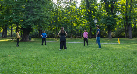 Graz/Austria - June 24, 2019: People doing yoga and sports in the park, in summertimeのeditorial素材