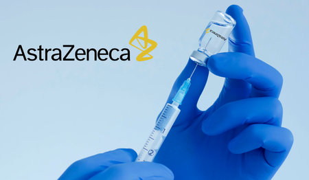 Graz, Austria-26.01.2021: Doctor hands holding a AstraZeneca vaccine bottle and syringe, beginning of mass vaccination for coronavirus COVID-19, world immunization conceptのeditorial素材