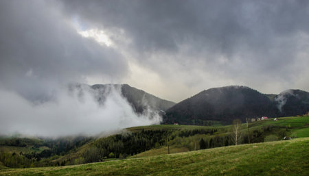 Clouds over the Carpathian Mountains, near Magura Village, Transylvania, Romania.の写真素材