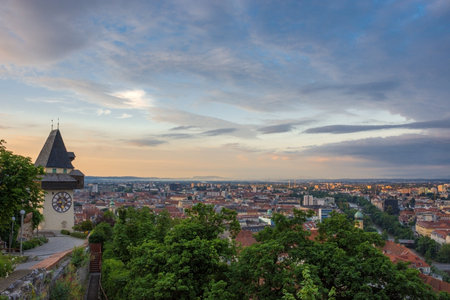 Cityscape of Graz and the famous clock tower (Grazer Uhrturm) on Shlossberg hill, Graz, Styria region, Austriaのeditorial素材