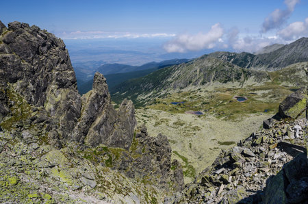 Mountain landscape and glacial lake in Retezat National Park, Carpathian Mountains, Romaniaの写真素材