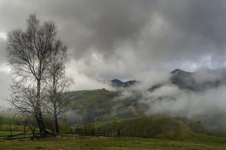 Clouds over the Carpathian Mountains, near Magura Village, Transylvania, Romania.の写真素材