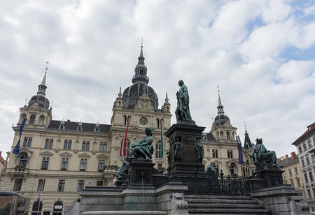 Erzherzog Johann fountain at Hauptplatz (main square) and Town Hall in the background, in Graz, Styria region, Austria.の写真素材