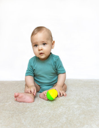 Sweet little baby boy portrait on white backgroundの写真素材