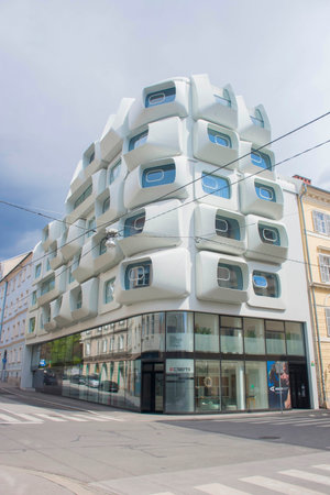 Graz, Austria-25.04.2021: Apartments in Argos modern residential building, planned by famous Zaha Hadid Architects, with big dimensioned white windows, in the heart of the old city of Grazのeditorial素材